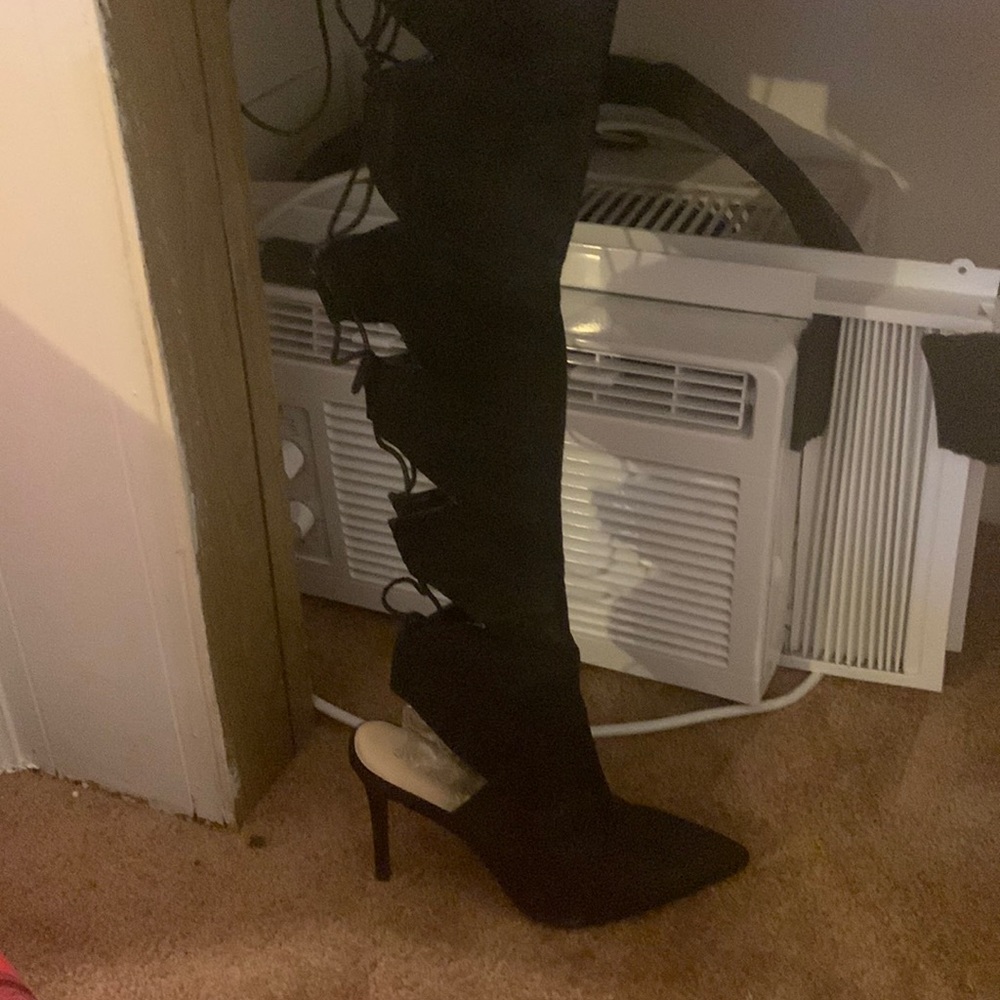 Black thigh high boots